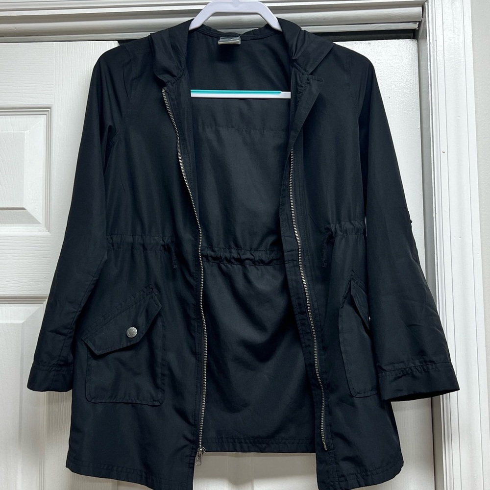 Black windbreaker